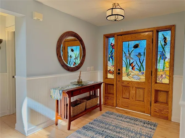 a kitchen with refrigerator a sink and dishwasher