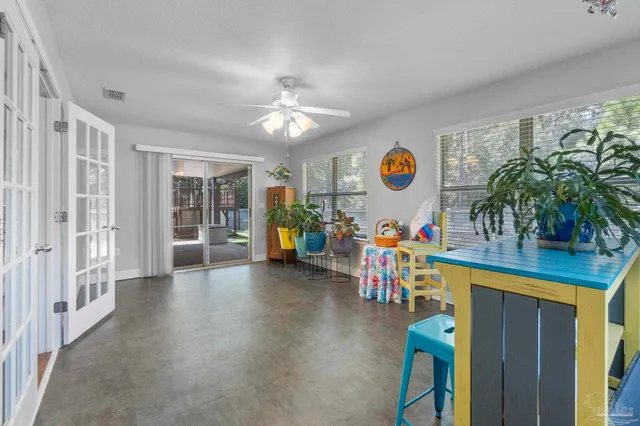 a bedroom with bed and window
