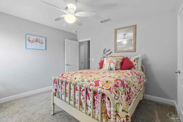 a car room with window and ceiling fan