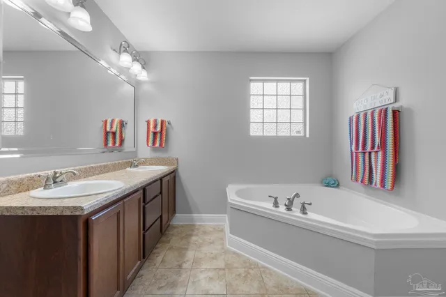 a bathroom with a toilet and shower