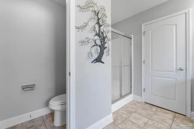 a bathroom with a sink double vanity and a mirror