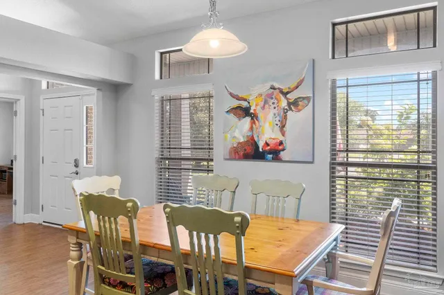 a large kitchen with lots of counter space and stainless steel appliances