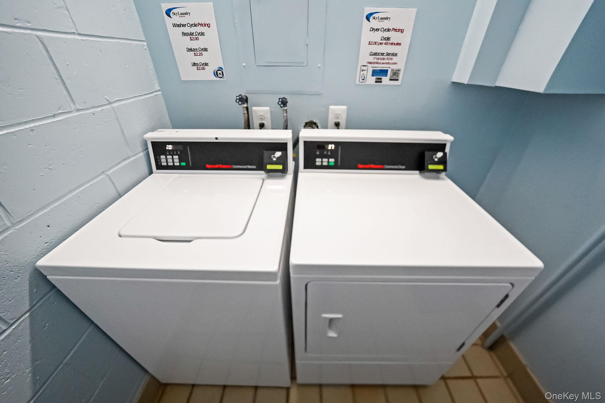 213-02 42nd Avenue, Unit 2A Queens, NY 11361 - Photo 22 of 24 a utility room with dryer and washer