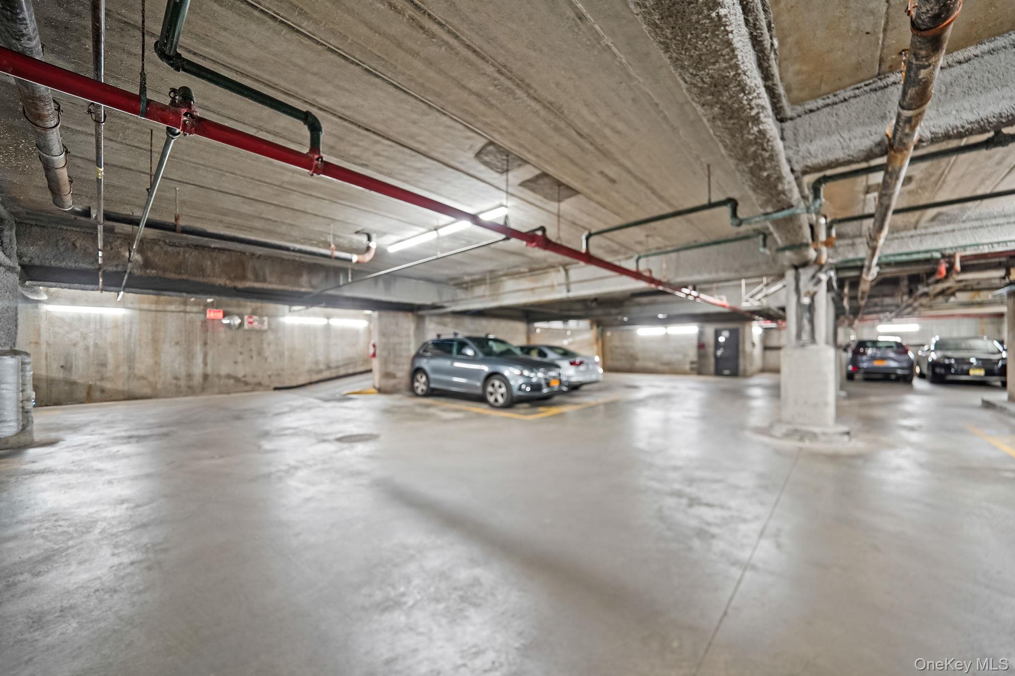 213-02 42nd Avenue, Unit 2A Queens, NY 11361 - Photo 24 of 24 a view of parking space with parked cars