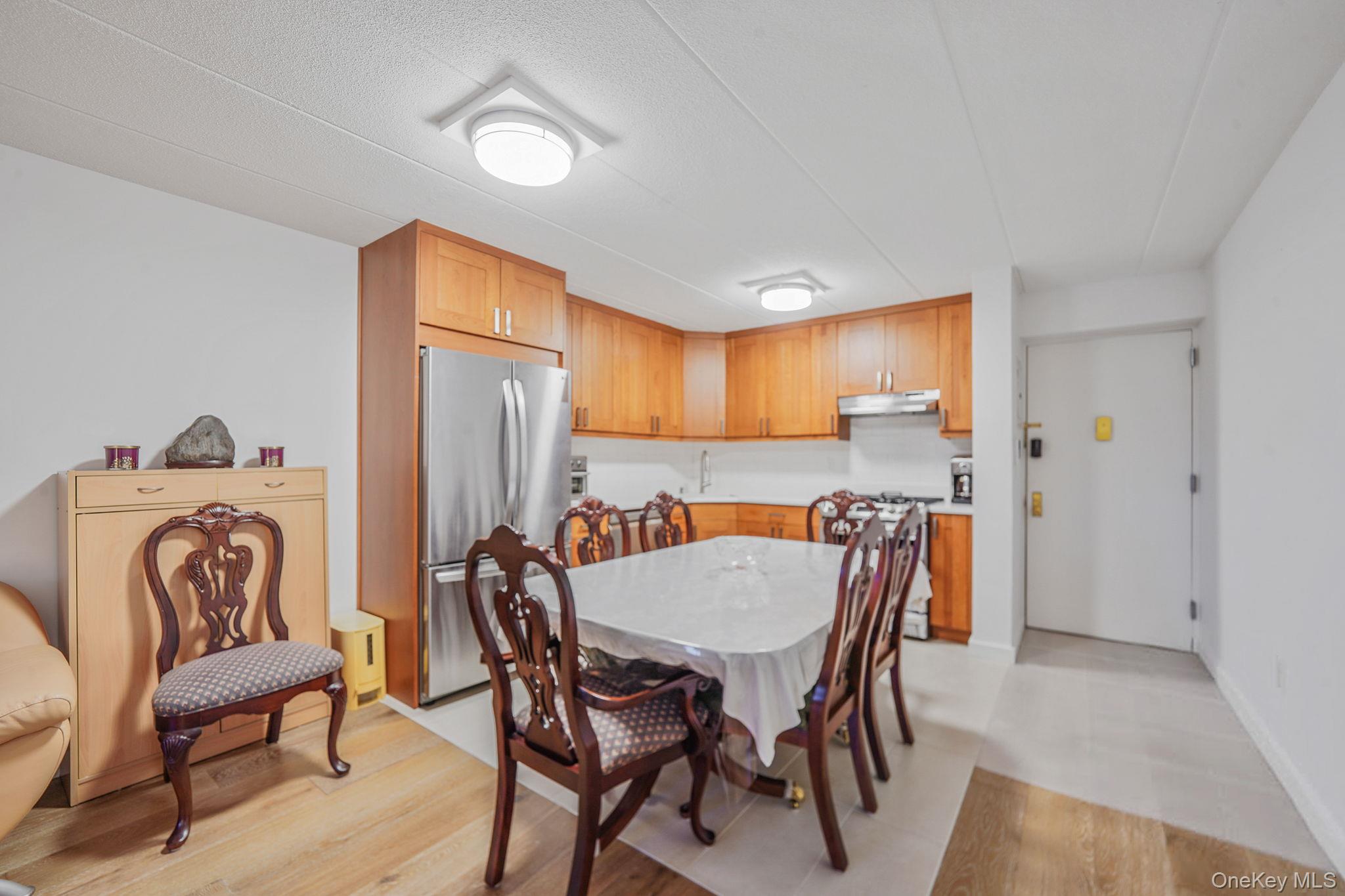 213-02 42nd Avenue, Unit 2A Queens, NY 11361 - Photo 7 of 24 a view of a dining room with furniture