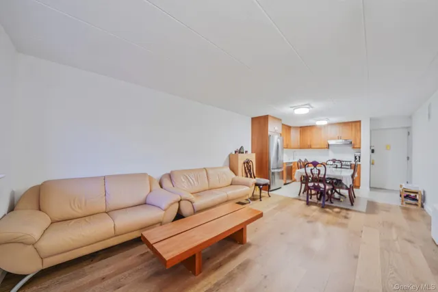 a view of a livingroom with furniture and wooden floor