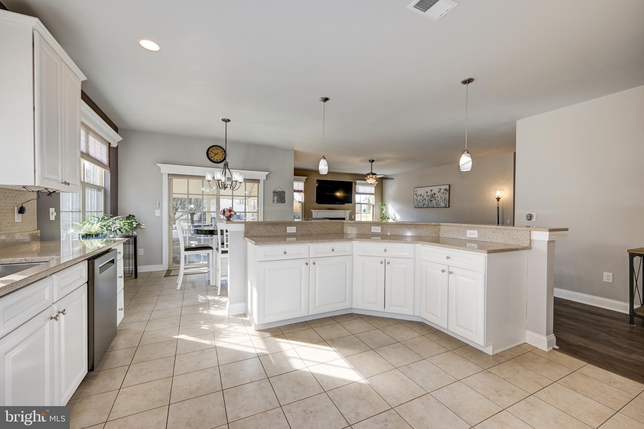 18 Genova Drive West Berlin, NJ 08091 - Photo 12 of 49 a kitchen with cabinets and chairs