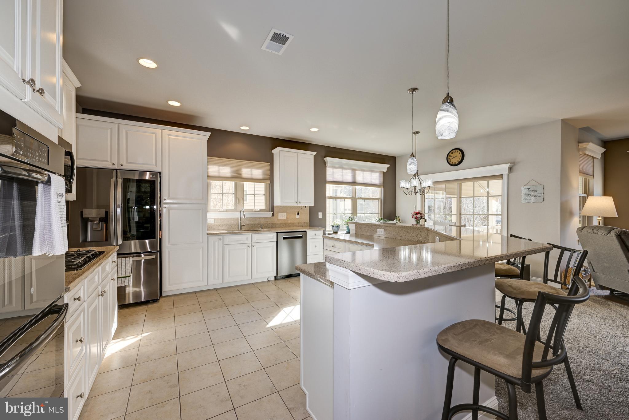 18 Genova Drive West Berlin, NJ 08091 - Photo 16 of 49 a kitchen with counter top space cabinets and stainless steel appliances