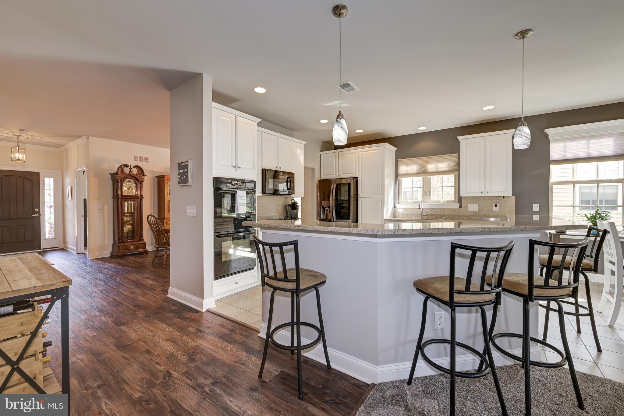 18 Genova Drive West Berlin, NJ 08091 - Photo 20 of 49 a view of a kitchen and dining room