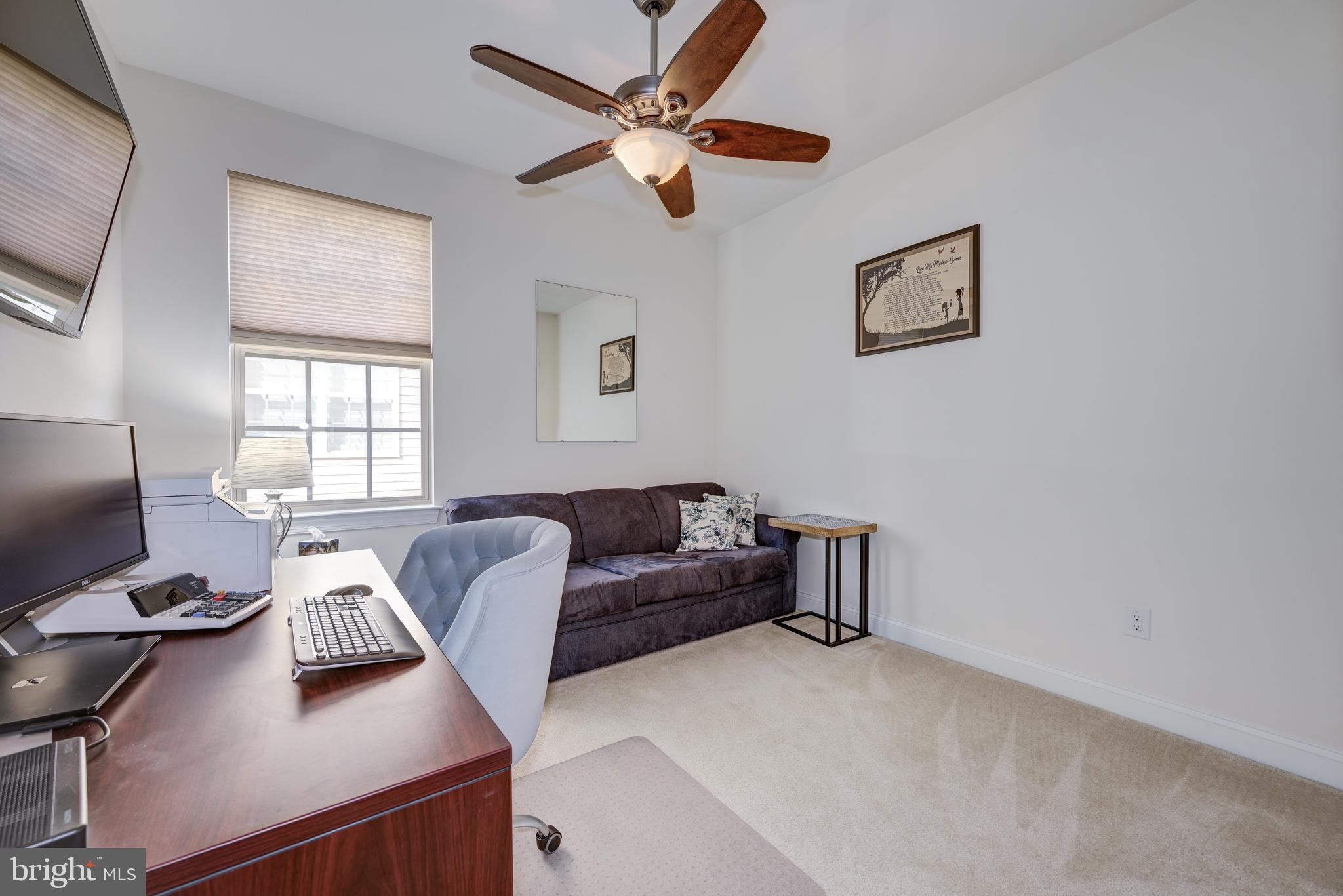 18 Genova Drive West Berlin, NJ 08091 - Photo 33 of 49 a living room with furniture and a window