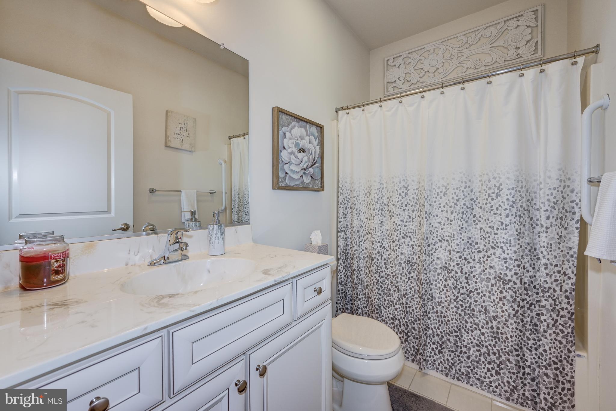 18 Genova Drive West Berlin, NJ 08091 - Photo 35 of 49 a bathroom with a granite countertop sink a toilet and a mirror