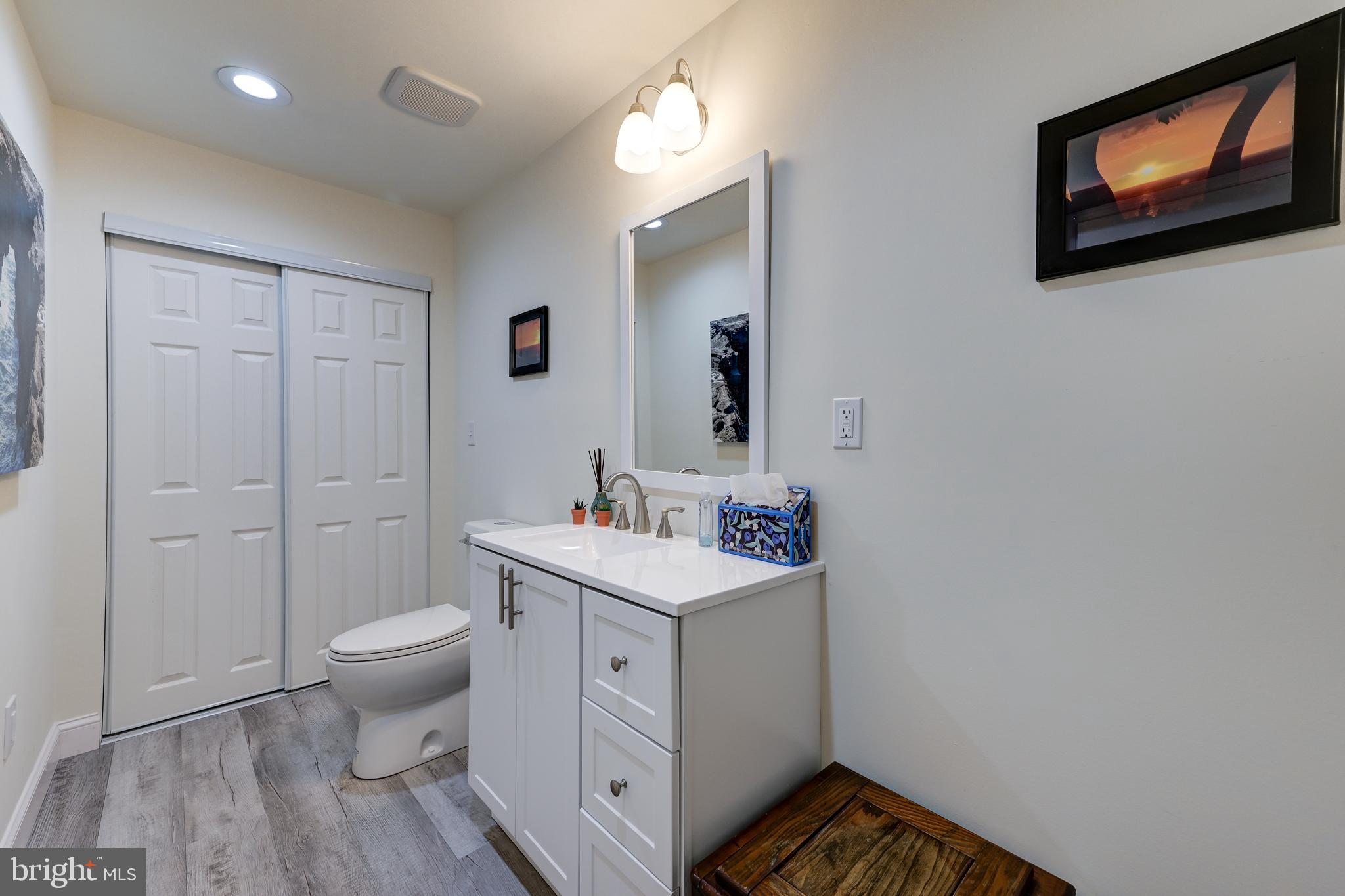 18 Genova Drive West Berlin, NJ 08091 - Photo 39 of 49 a view of bathroom with toilet sink and mirror