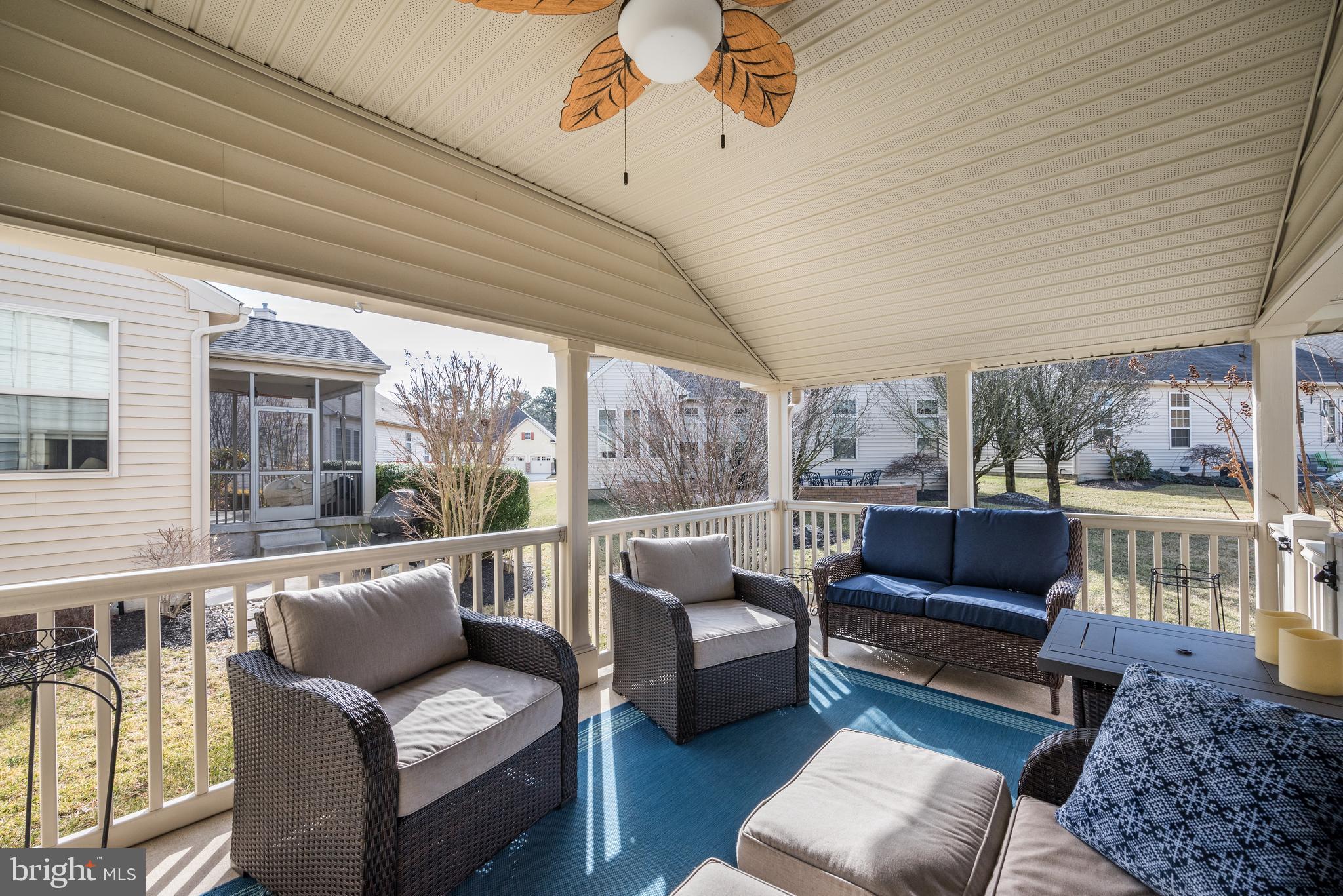 18 Genova Drive West Berlin, NJ 08091 - Photo 46 of 49 a living room with furniture and a floor to ceiling window