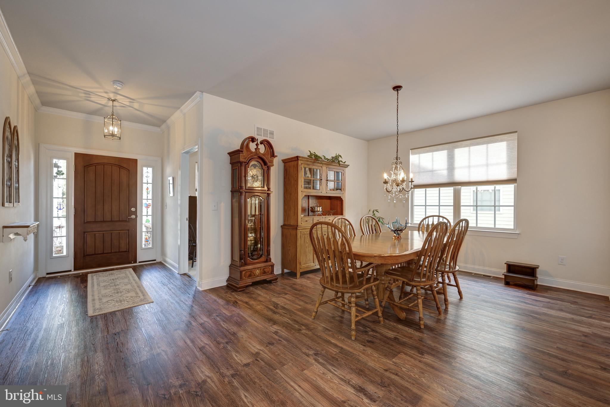 18 Genova Drive West Berlin, NJ 08091 - Photo 7 of 49 a view of a dining room with furniture window and wooden floor