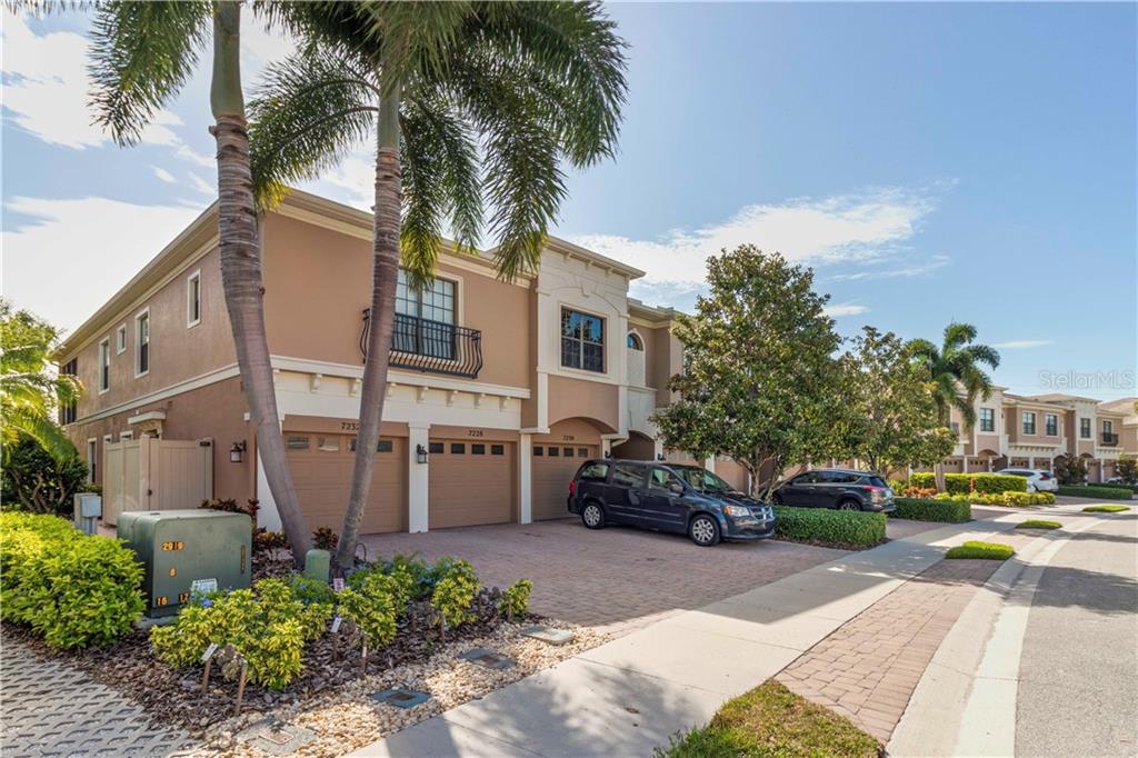 7232 Hamilton Road Bradenton, FL 34209 - Photo 1 of 1 a view of a parked cars in front of a building