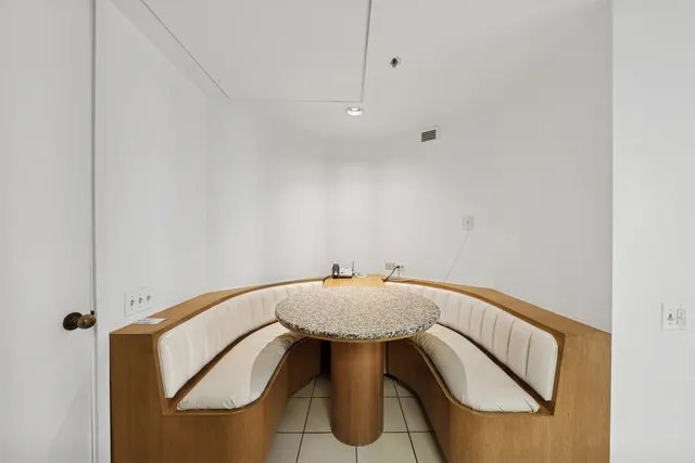 a kitchen with stainless steel appliances granite countertop a sink stove and microwave