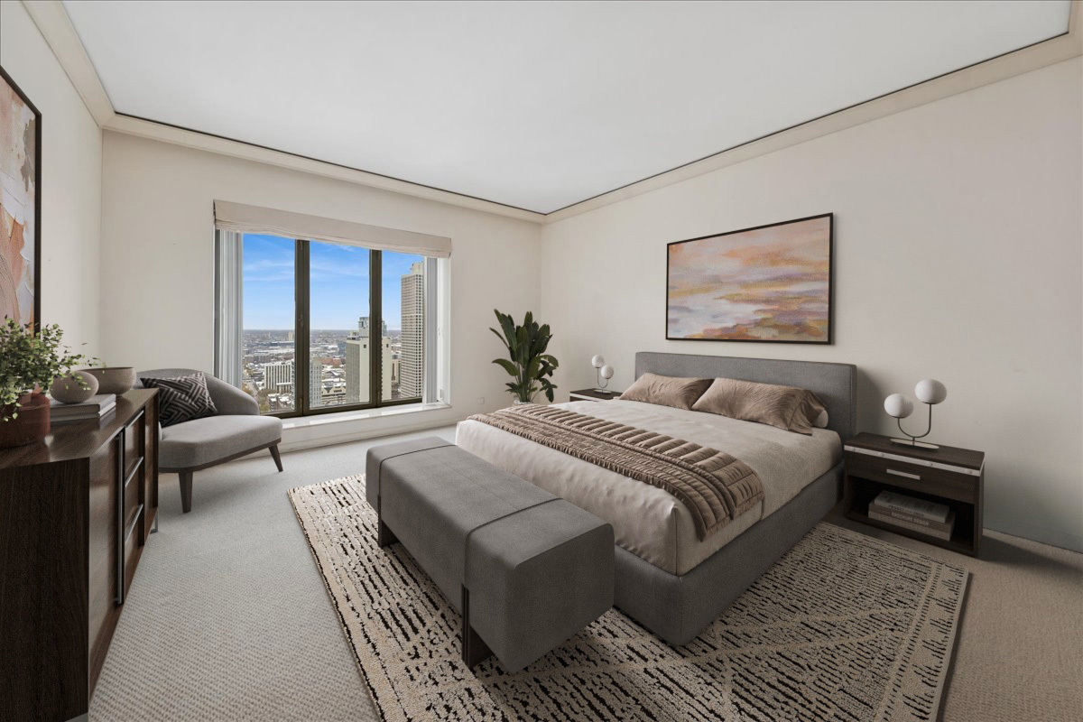 950 North Michigan Avenue, Unit 3104 Chicago, IL 60611 - Photo 17 of 28 a bedroom with a large bed couch and a window