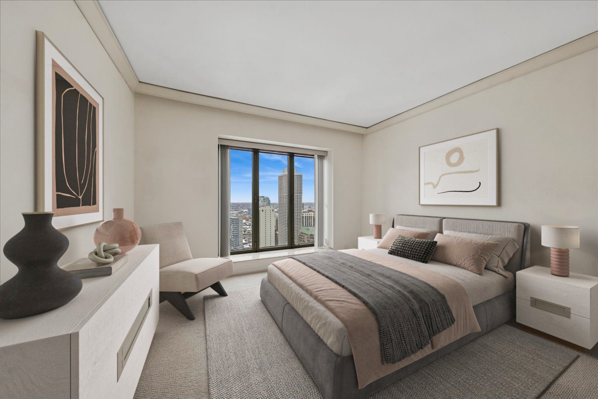 950 North Michigan Avenue, Unit 3104 Chicago, IL 60611 - Photo 21 of 28 a bedroom with a bed and a couch