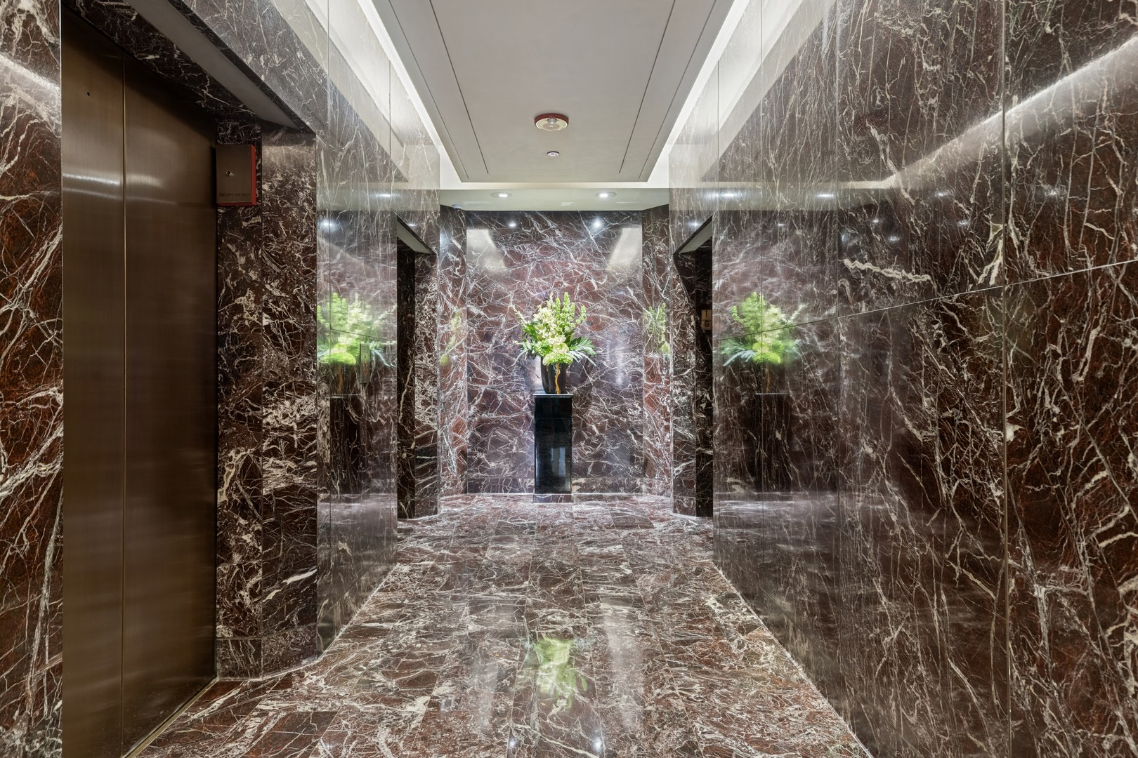 950 North Michigan Avenue, Unit 3104 Chicago, IL 60611 - Photo 5 of 28 a view of path along with trees