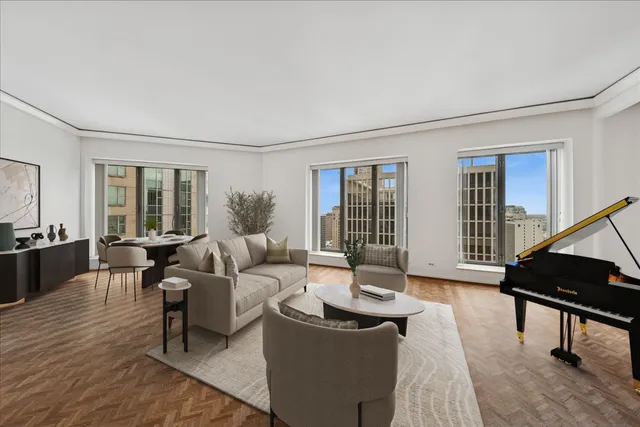 a living room with furniture and a window