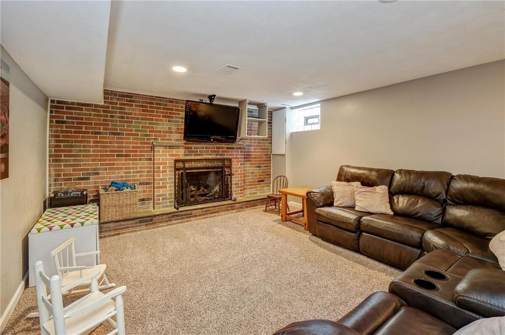 1731 Beaver Grade Road Coraopolis, PA 15108 - Photo 15 of 25 Huge Basement area with fireplace and fresh carpet!