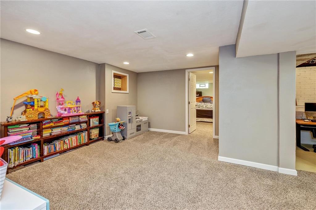 1731 Beaver Grade Road Coraopolis, PA 15108 - Photo 16 of 25 Basement area is separated into sitting area and play area for the family!