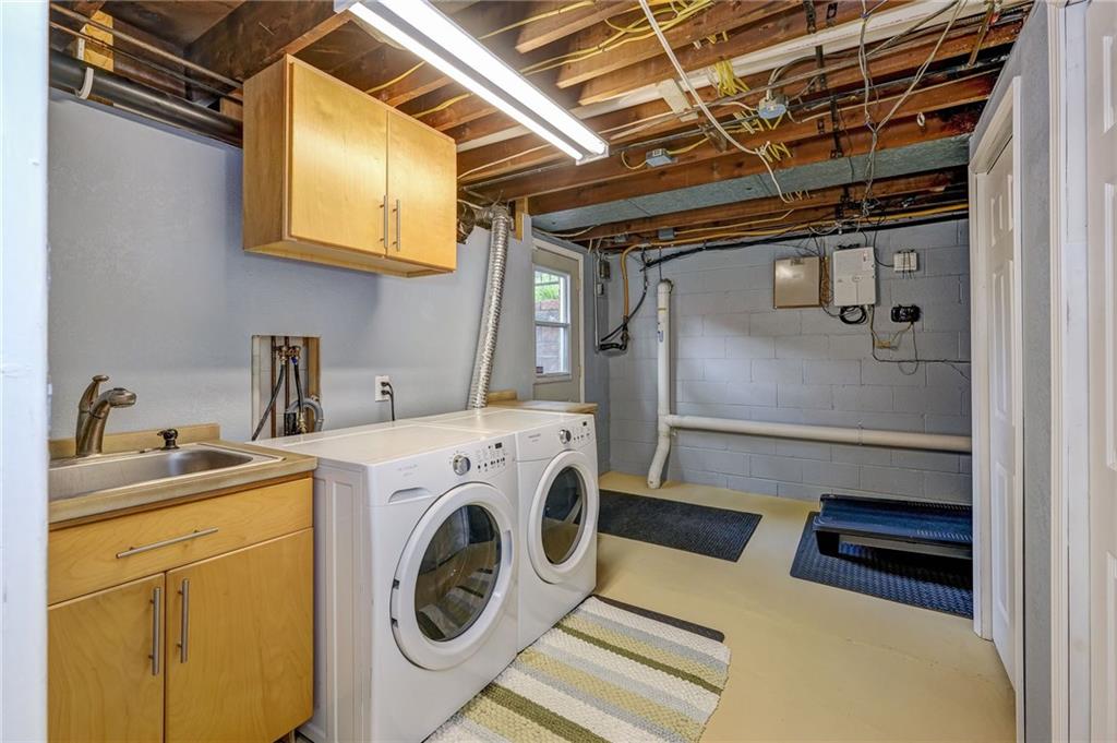 1731 Beaver Grade Road Coraopolis, PA 15108 - Photo 18 of 25 Laundry area with custom sink and cabinetry and storage cabinets!