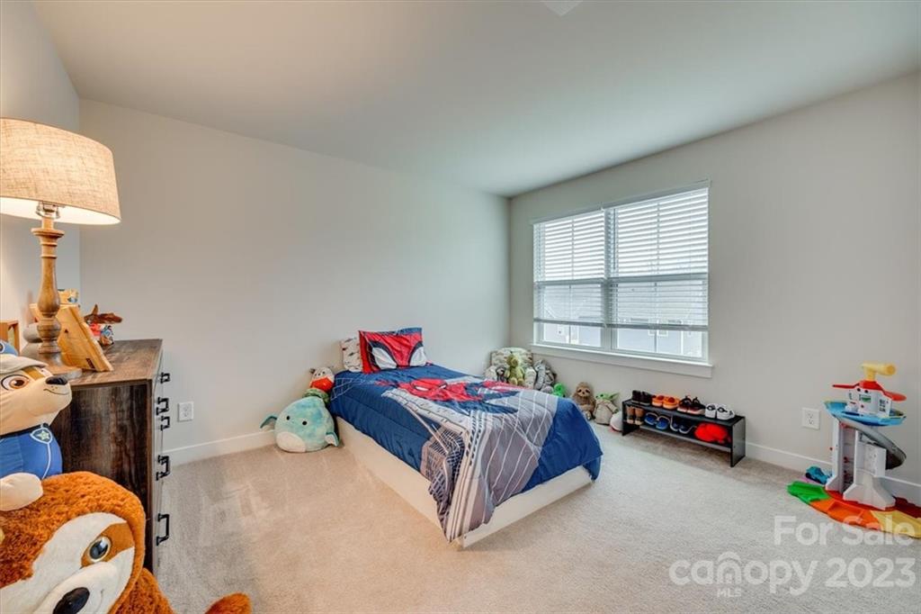 7102 Messina Road Indian Land, SC 29707 - Photo 29 of 38 a bedroom with a bed and a window