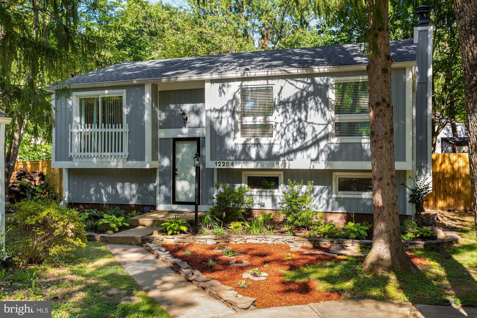 12264 Turkey Wing Court Reston, VA 20191 - Photo 2 of 33 Exterior front with newer siding and roof