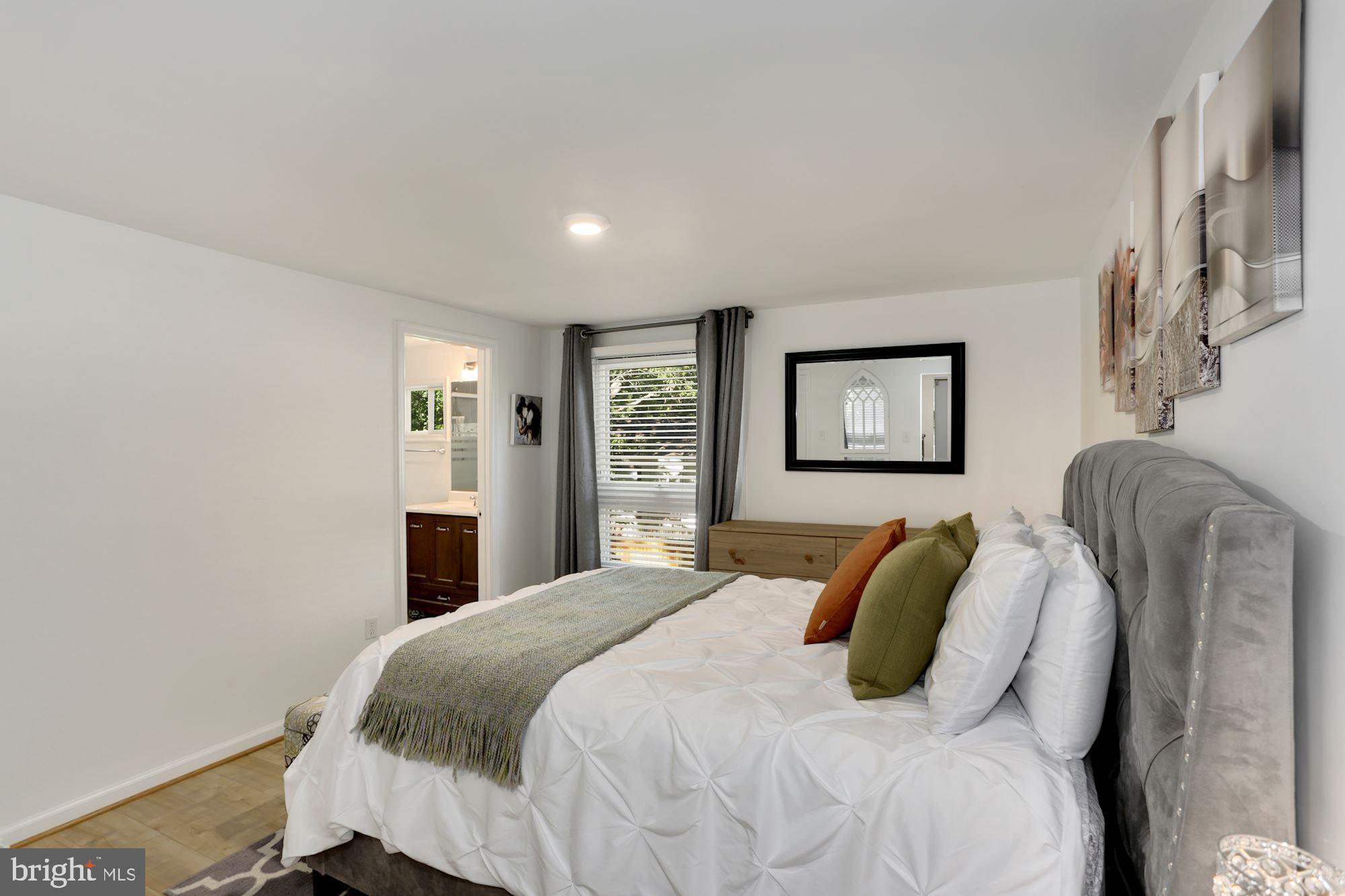 12264 Turkey Wing Court Reston, VA 20191 - Photo 16 of 33 Master bedroom with attached full renovated bath