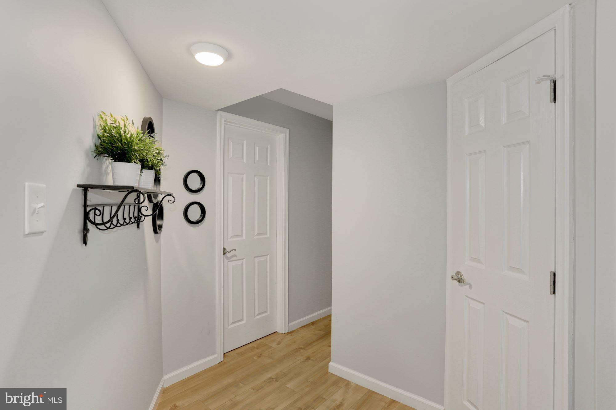 12264 Turkey Wing Court Reston, VA 20191 - Photo 24 of 33 Lower level hallway
