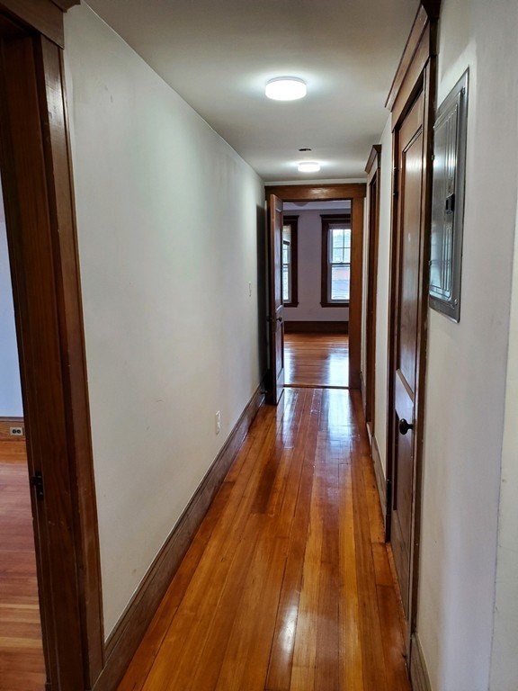 22 Allen Street, Unit 2 Arlington, MA 02474 - Photo 15 of 25 a view of gallery with wooden floor