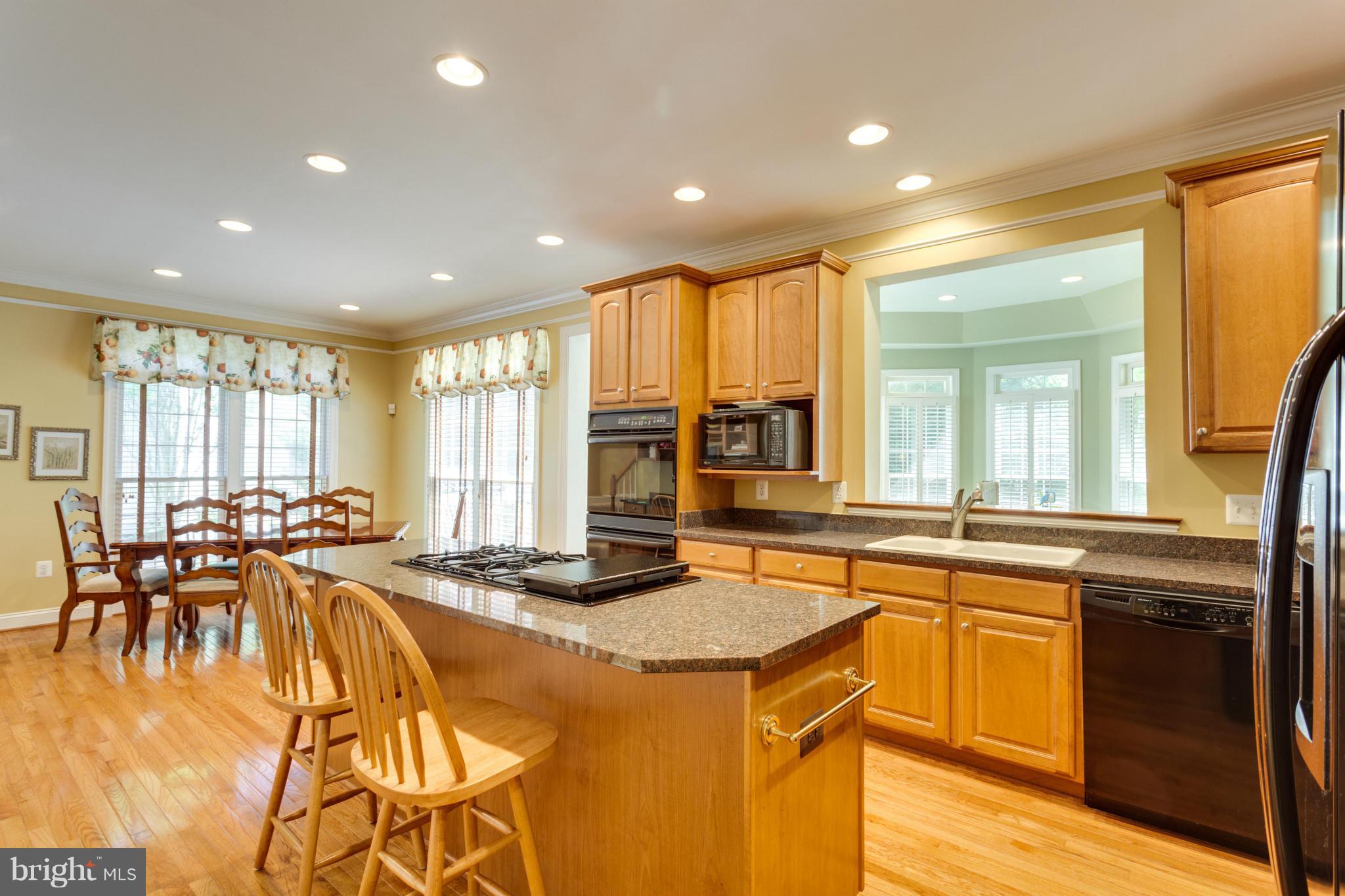 2754 Cody Road Vienna, VA 22181 - Photo 3 of 30 Gourmet Kitchen opens to Sunroom