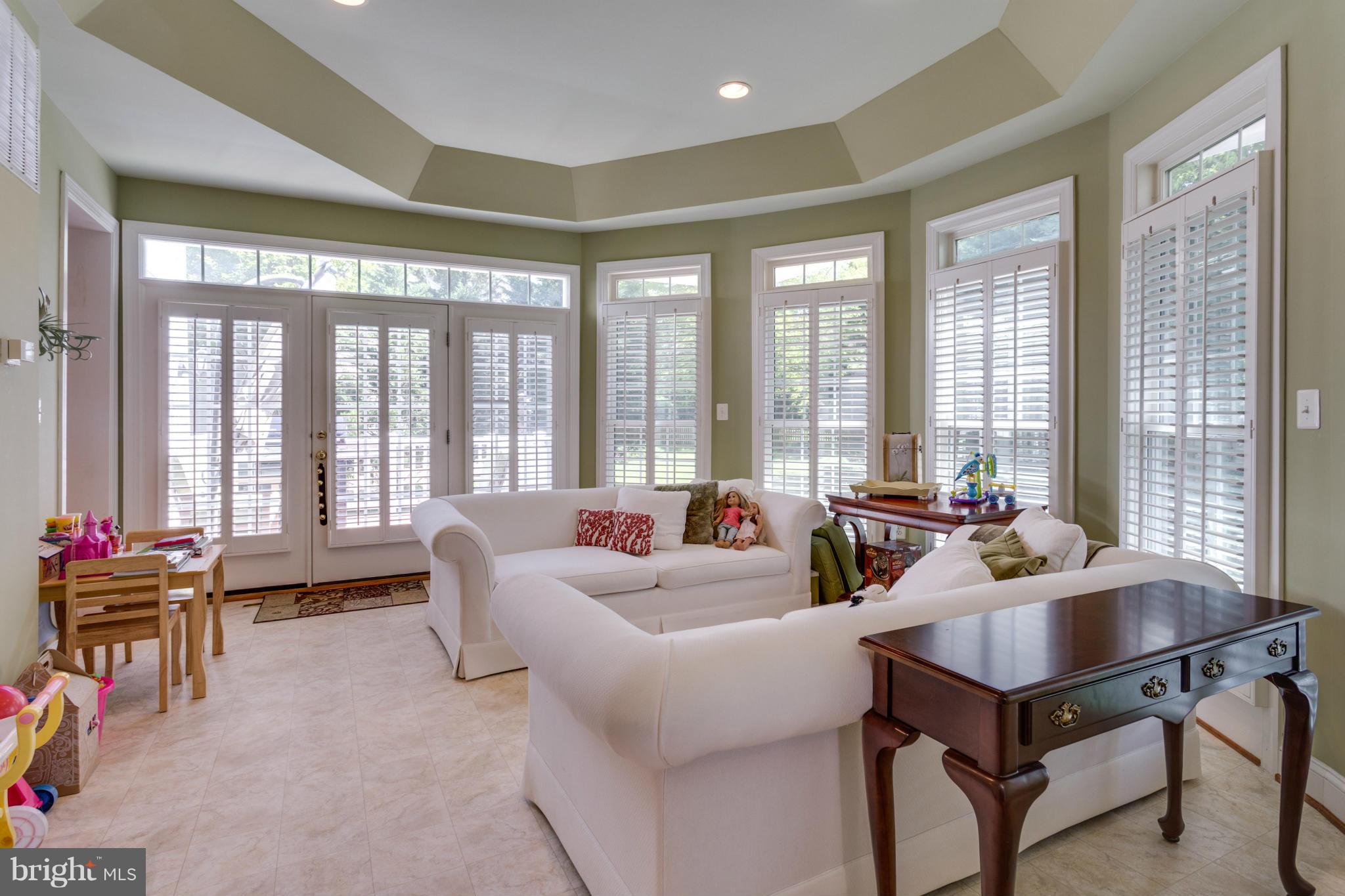 2754 Cody Road Vienna, VA 22181 - Photo 8 of 30 Sunroom open to rear Deck and Brick Patio