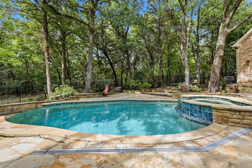 970 Crystal Cove Oak Point, TX 75068 - Photo 33 of 40 a view of a swimming pool with a patio