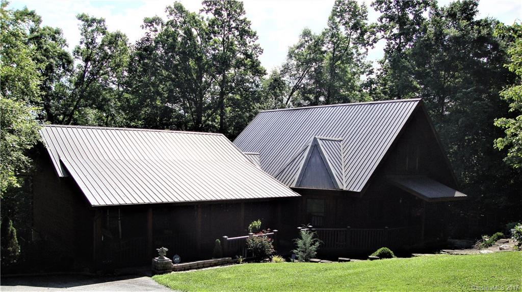 720 Potneck Road, Unit 1517 Salisbury, NC 28147 - Photo 2 of 24 a backyard of a house with table and chairs