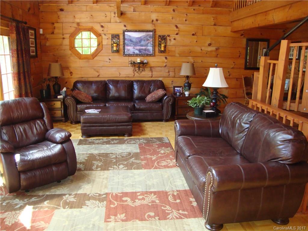 720 Potneck Road, Unit 1517 Salisbury, NC 28147 - Photo 13 of 24 a living room with furniture and a fireplace