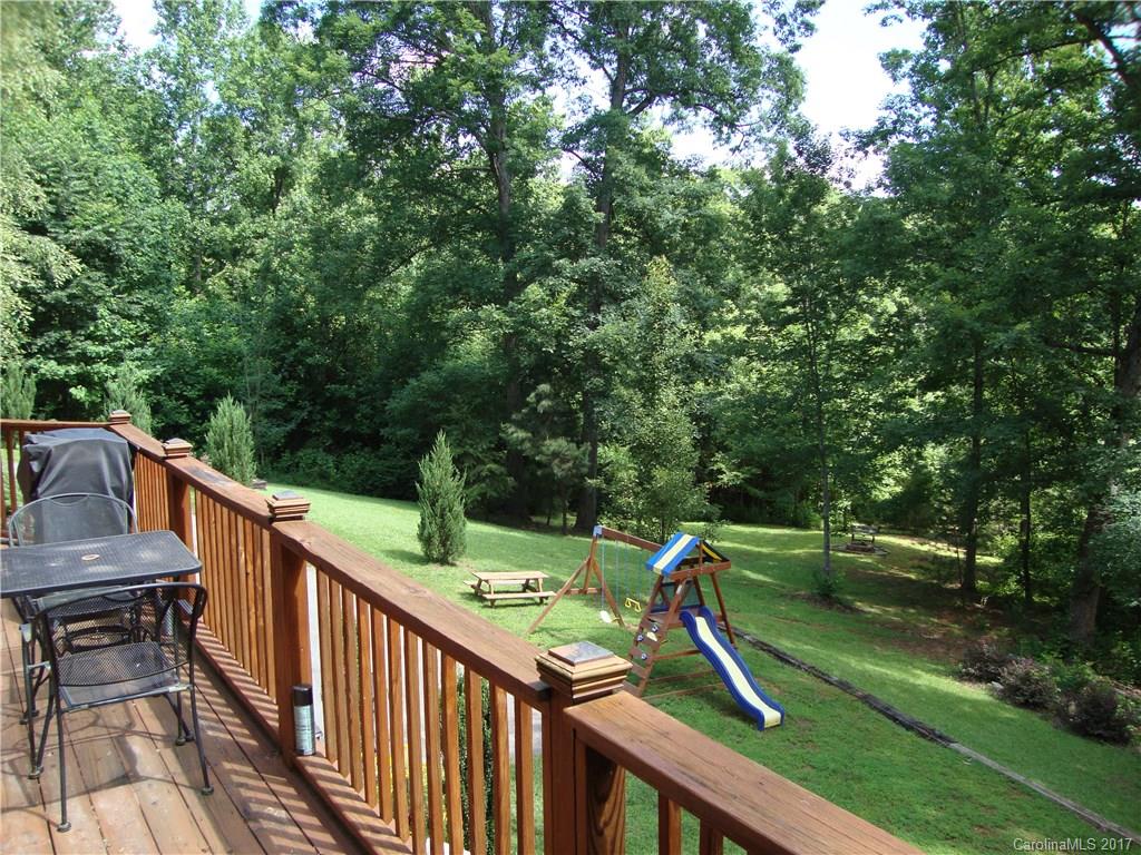 720 Potneck Road, Unit 1517 Salisbury, NC 28147 - Photo 24 of 24 a view of deck with chairs and wooden fence