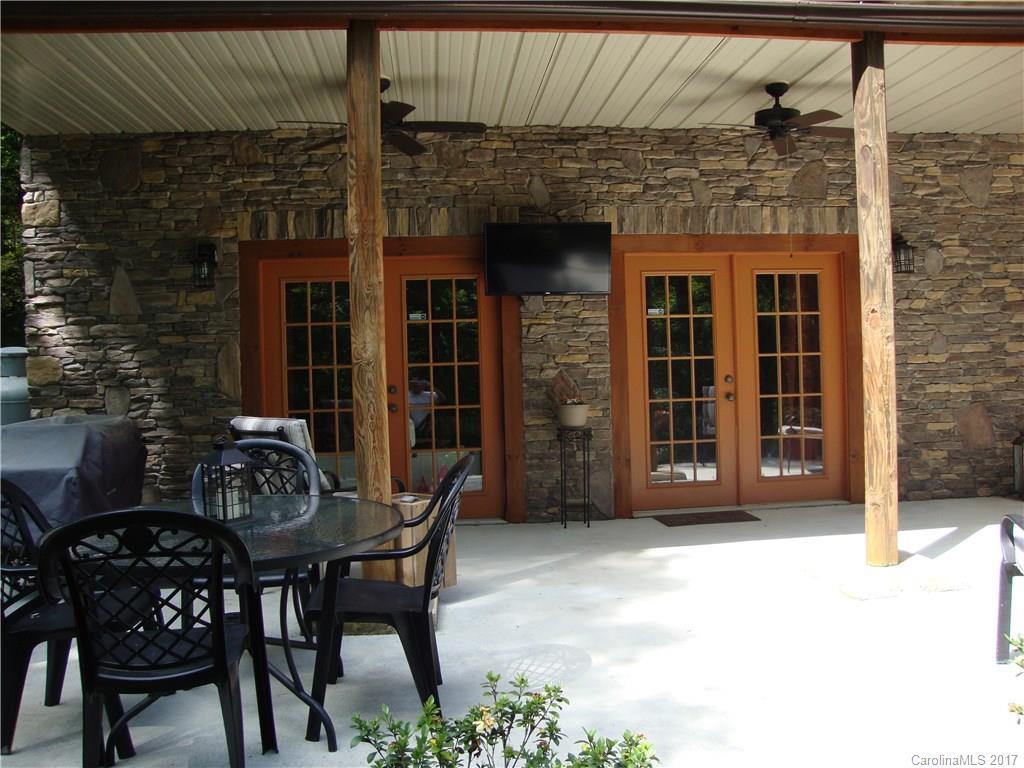 720 Potneck Road, Unit 1517 Salisbury, NC 28147 - Photo 6 of 24 a view of a patio with table and chairs and potted plants