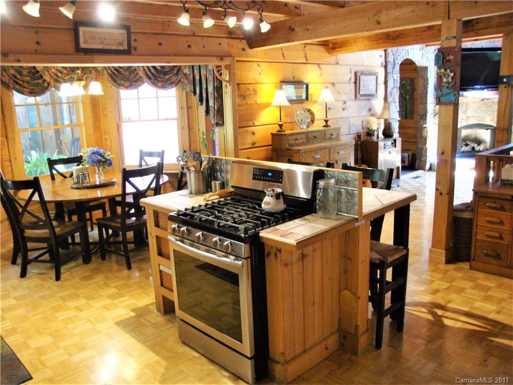 720 Potneck Road, Unit 1517 Salisbury, NC 28147 - Photo 10 of 24 a kitchen with a stove and refrigerator