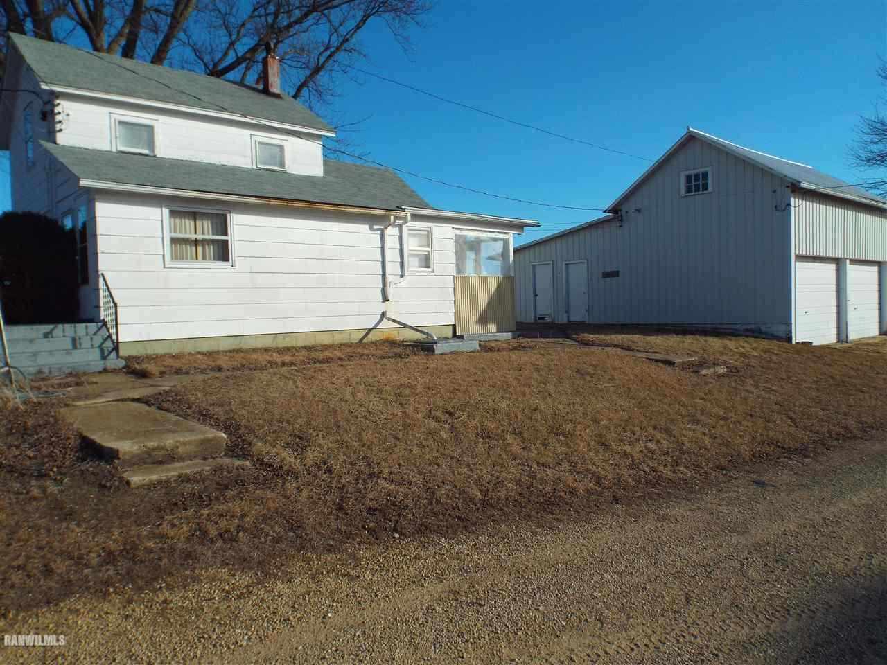 15983 West Cemetery Road Kent, IL 61044 - Photo 1 of 23 a backyard of a house