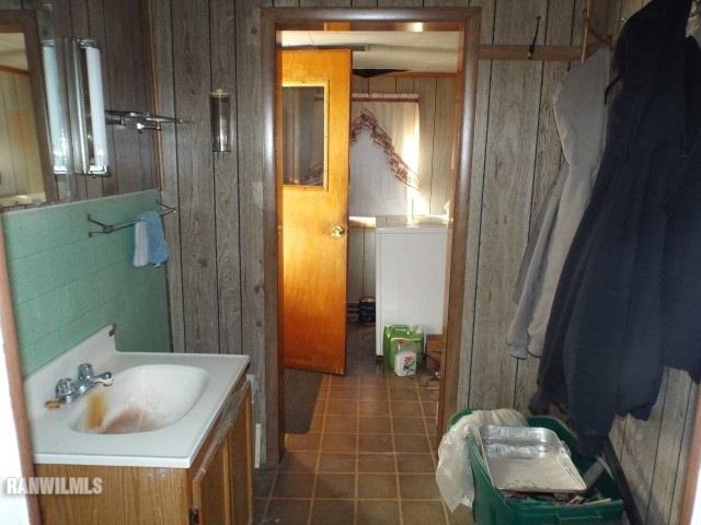 15983 West Cemetery Road Kent, IL 61044 - Photo 12 of 23 a bathroom with a sink and a mirror