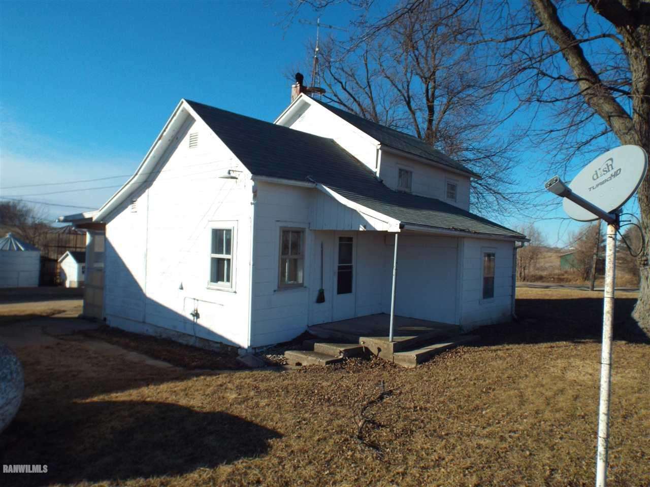 15983 West Cemetery Road Kent, IL 61044 - Photo 14 of 23 a view of a house with a yard