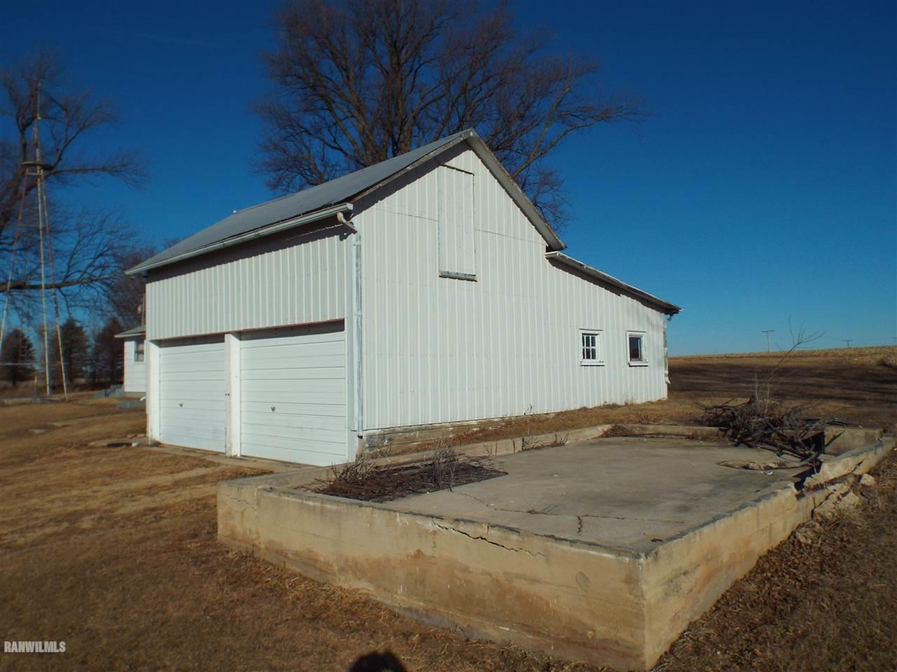 15983 West Cemetery Road Kent, IL 61044 - Photo 15 of 23 a view of a house with a yard