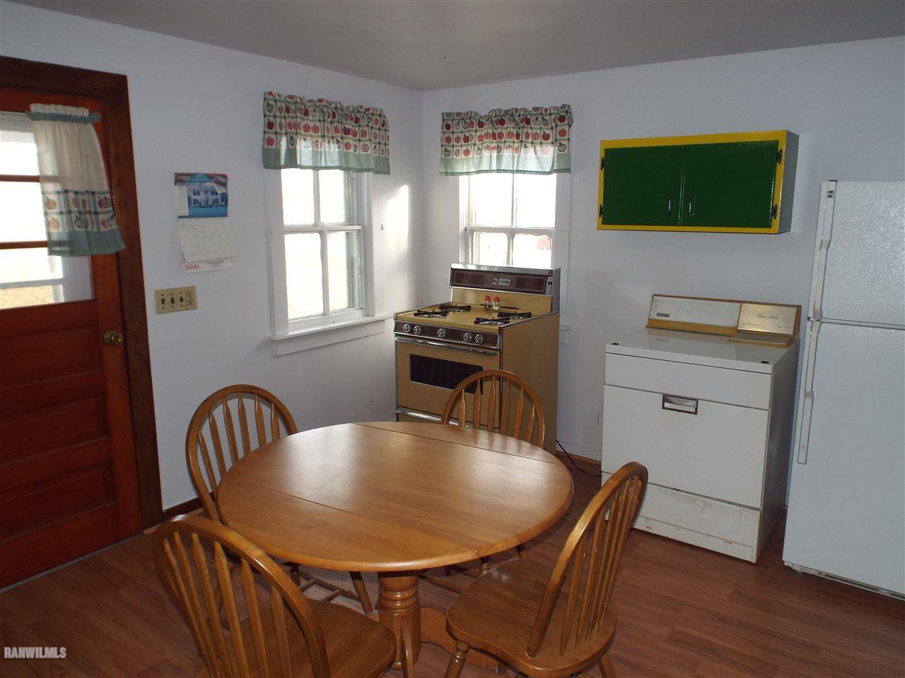 15983 West Cemetery Road Kent, IL 61044 - Photo 2 of 23 a dining room with furniture and window