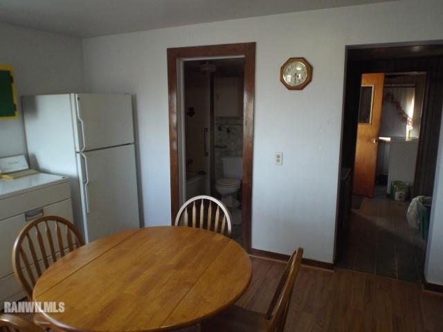 15983 West Cemetery Road Kent, IL 61044 - Photo 4 of 23 a view of a bedroom with a bed and wooden floor