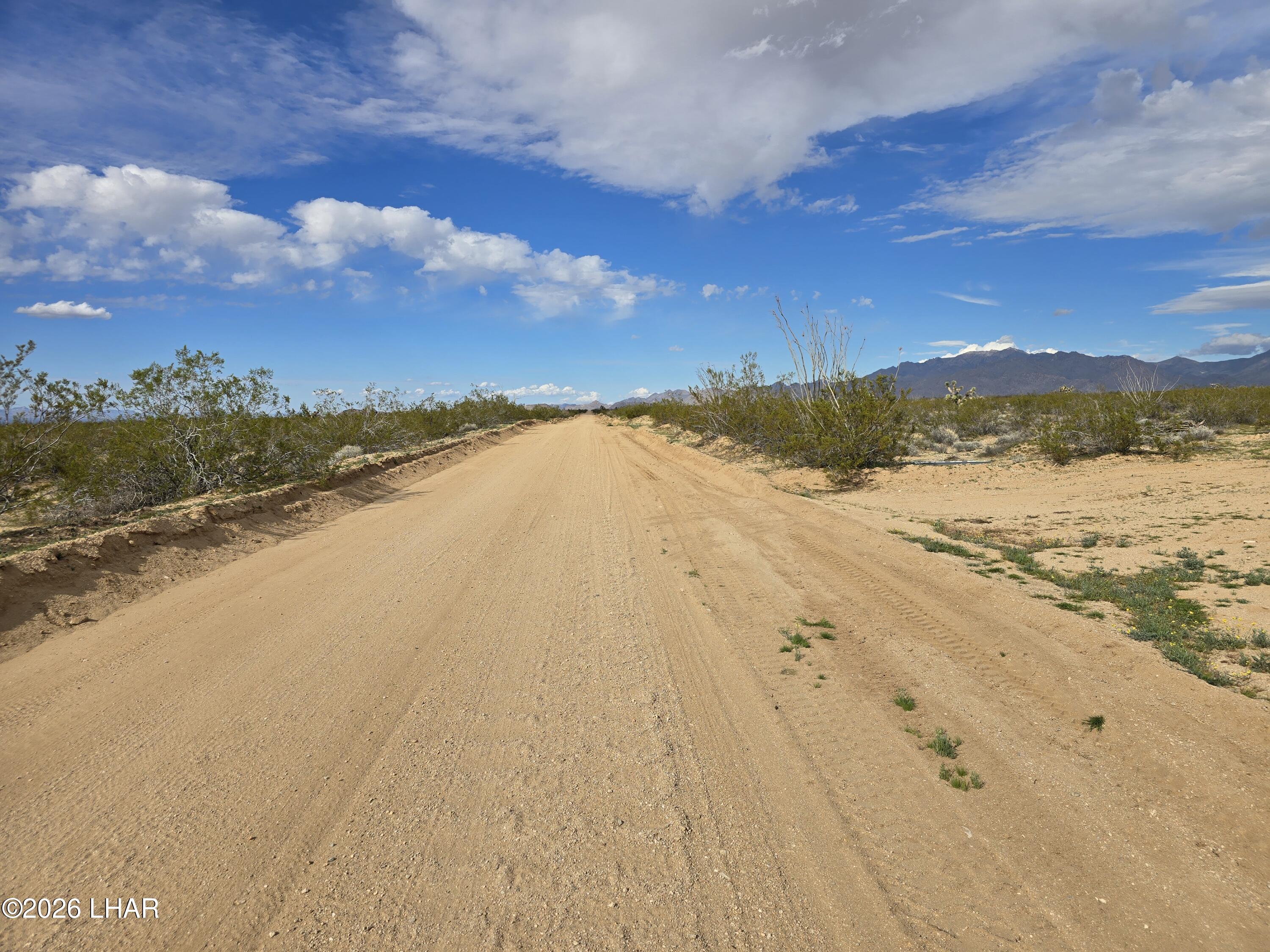 3412 South Lone Ranger Road Yucca, AZ 86438 - Photo 12 of 18 a view of an ocean beach