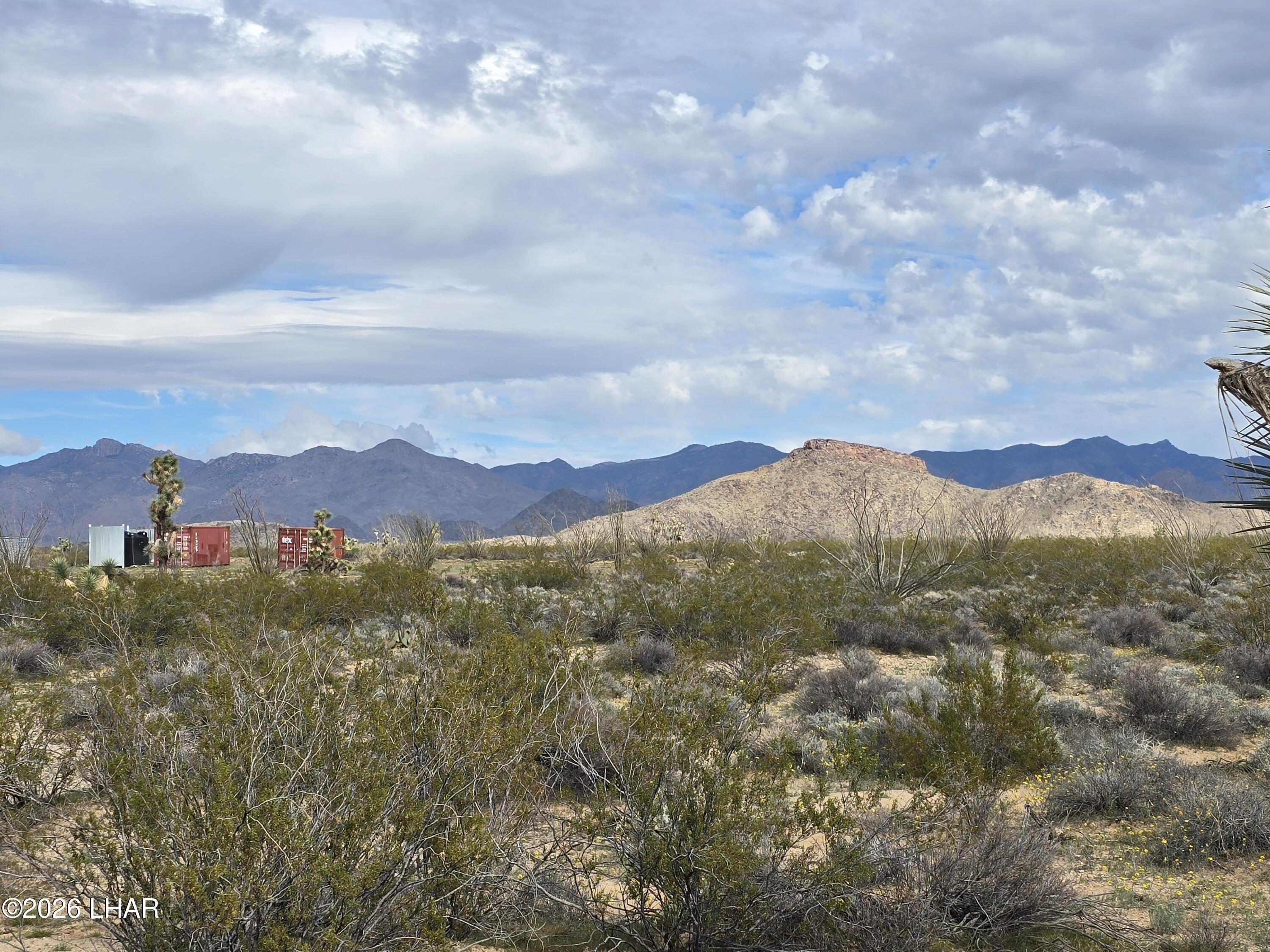 3412 South Lone Ranger Road Yucca, AZ 86438 - Photo 13 of 18 a view of a city with mountain