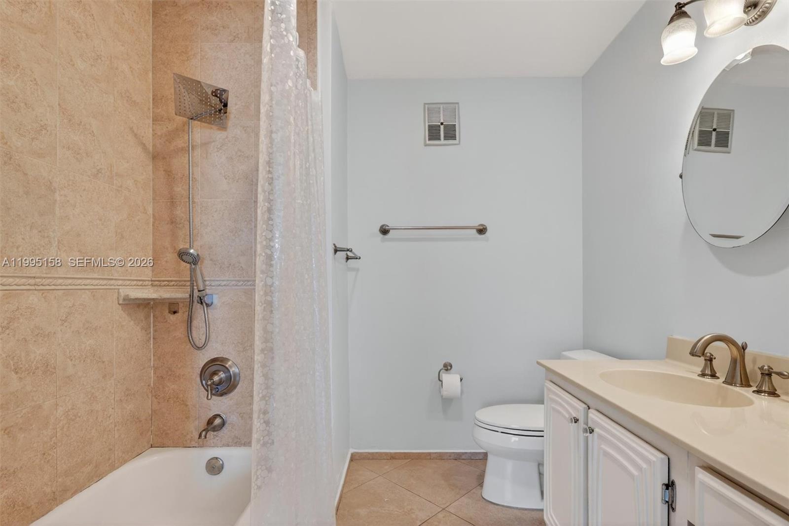 6161 Southwest 90th Court, Unit G2 Miami, FL 33173 - Photo 22 of 47 a bathroom with a sink toilet and shower
