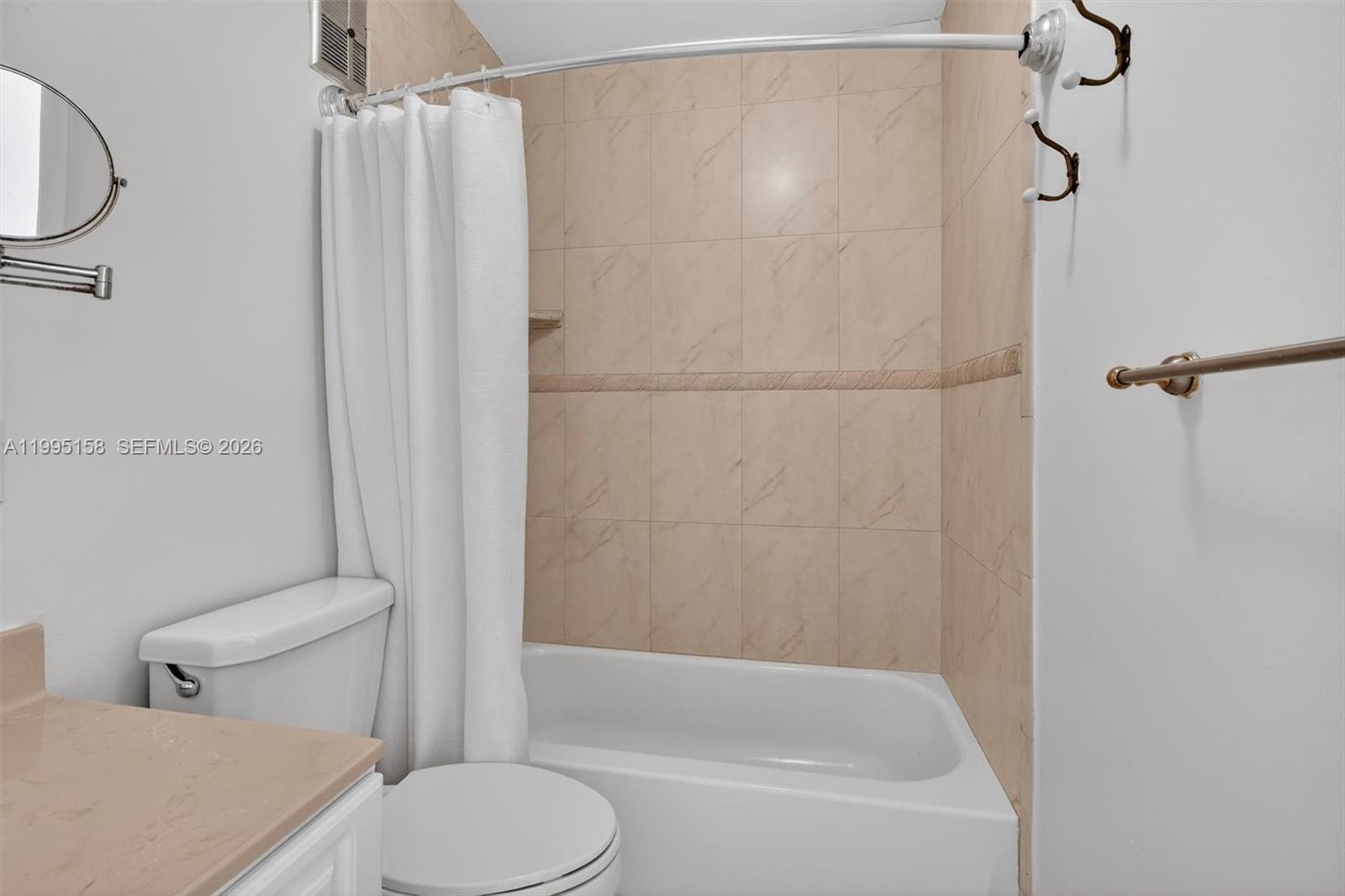 6161 Southwest 90th Court, Unit G2 Miami, FL 33173 - Photo 29 of 47 a bathroom with a toilet and a shower